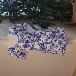 City Vibe Blue White Floral V Neck Short Sleeve Back Bow Flowy Lined Mini Skirt